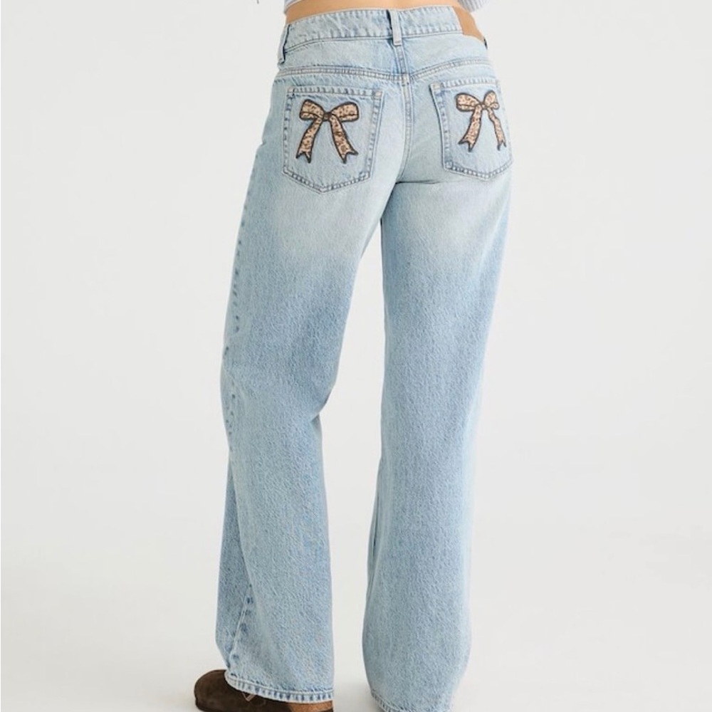 Low rise baggy leopard bow jeans never worn new with tag